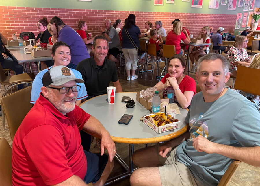 CNC teammates at a team dinner